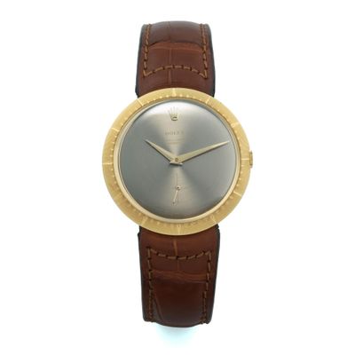 an image of a wrist watch with a brown leather strap