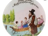 a plate with a picture of a man and children in a boat