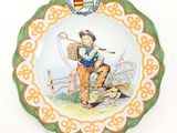 a plate with a picture of a boy on it