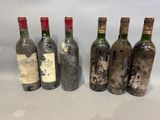 six bottles of wine are lined up in a row