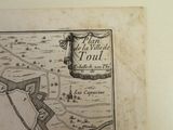 a map of a town on the wall of a room