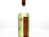 a bottle of alcohol that is sitting on a table