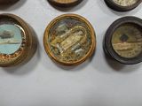 five different types of tins sitting on a table