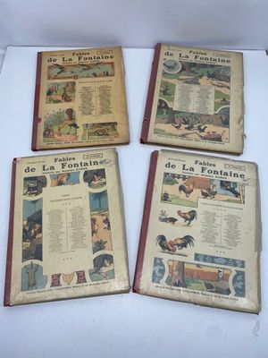 four books on a white table with pictures of people and animals on them