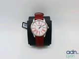 a watch that is sitting on top of a black box