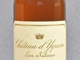 an image of a bottle of wine sitting on top of a table