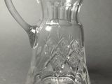 an image of a glass pitcher on a table