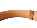 the belt is made of leather and has a gold buckle