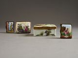 three small porcelain boxes with pictures of people on them sitting next to each other