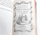 an open book with a picture of a man and a woman on it