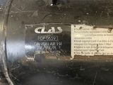 a black blower sitting on the floor next to a blue machine