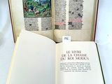 a open book with a picture of a man riding a horse on it