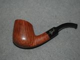 the pipe is sitting on the floor with a signature on it