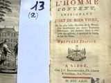 un vieux livre avec l'image d'un homme dessus