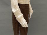 an image of a mannequin dressed in a white shirt and brown skirt