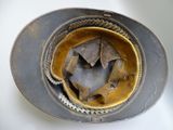a helmet that has a hole in the middle of it