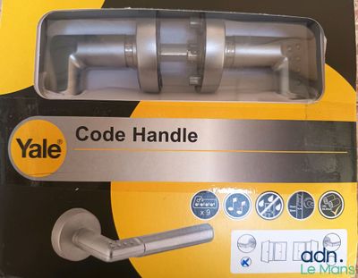 a box with a handle on it that has a sticker on it