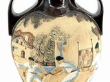 a vase with a painting on it on a white background