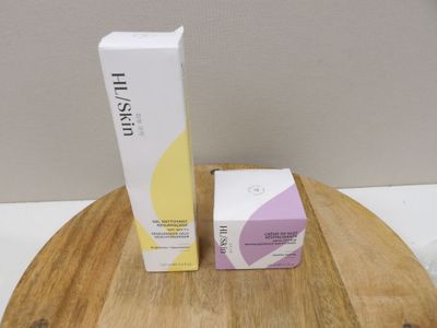 a picture of a box and a box of cream on a table