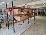 a room with a lot of boxes and boxes on the shelves