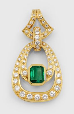 un pendentif en émeraude et diamants