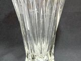 a glass vase that is sitting on a table
