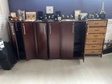 a room with a lot of drawers and cabinets in it