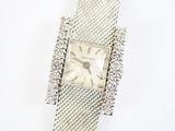 an image of a ladies ' s watch with diamonds on it