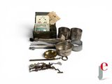 many different items that are sitting on a white surface