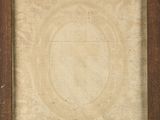 an old picture frame with a circular design on the inside of it