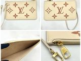 louis vuittou wallet purse with gold hardware and zipper closure