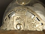 a close up of a helmet with a crest on it