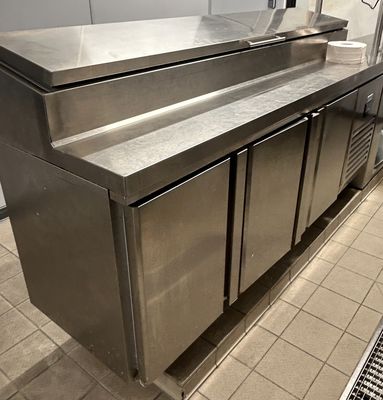 a stainless steel counter in a commercial kitchen