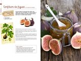 figs and honey in a jar with a spoon on a table