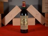 a bottle of wine that is sitting on a table