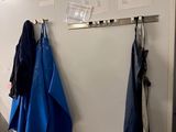 two umbrellas hanging on a wall in a room