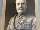 an old black and white photo of a man in a military uniform