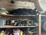 a room with a lot of items on the shelves