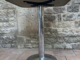 an image of a table with a sign on it