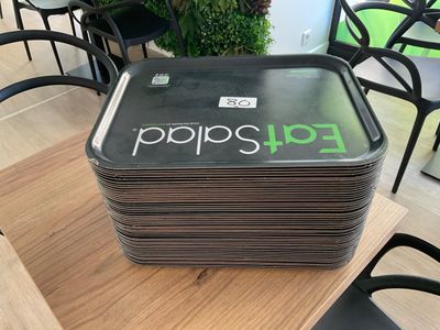 a stack of food sitting on a table in a restaurant