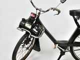 a black bike with a black seat and a black handlebar