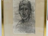 l'image d'un dessin d'un visage de femme dans un cadre doré