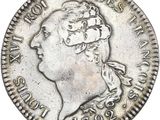 une pièce d'argent portant une tête de femme