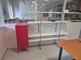 a red locker in the corner of a room
