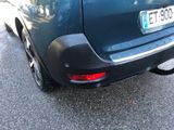 a car that is parked on the side of the street