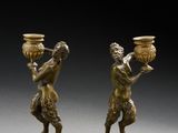 paire de figurines en bronze d'un garçon et d'une fille
