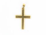 pendentif en forme de croix en or sur fond blanc