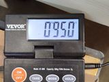 a digital scale that is sitting on top of a box