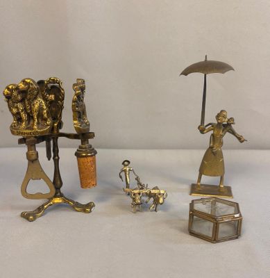 a few figurines that are sitting on a table