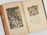 an open book with a picture of a man and a woman in a garden